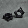 Garage Gear Aluminum collars for Olympic barbells.