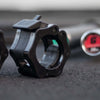 A quick release tab collar with built in rubber padding to lock on your barbell