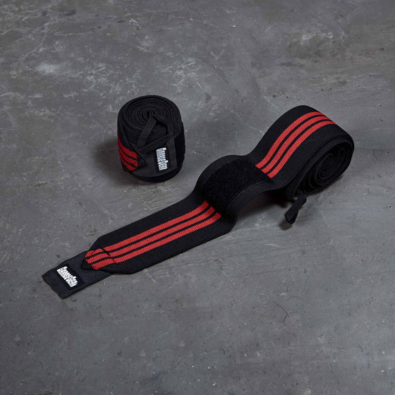 Garage Gear customizable tension solution for supporting knee joints while performing heavy lifts.